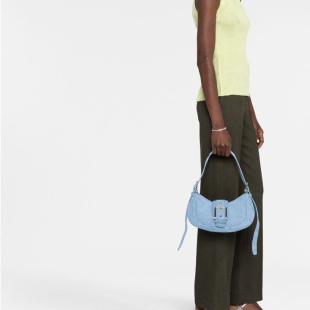 Osoi
decorative-buckle shoulder bag